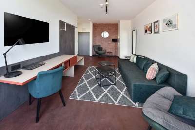 Dvoulůžkový apartmán se dvěma přistýlkami s balkonem