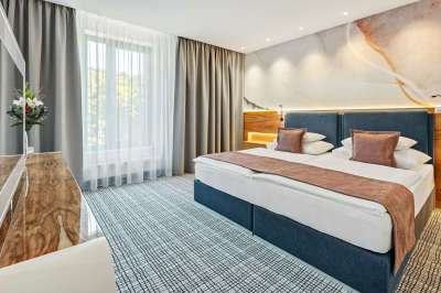 Junior suite city view s výhledem do Dvořákových sadů