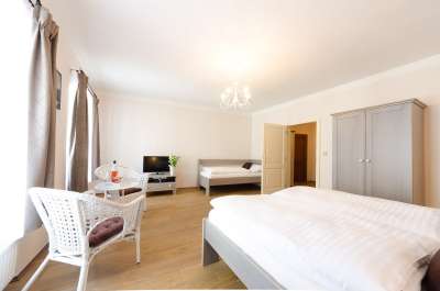 Třílůžkový pokoj