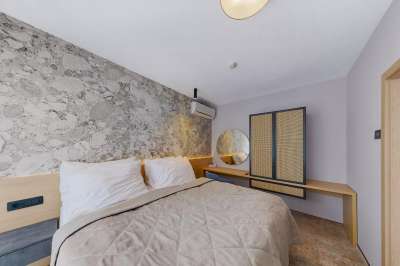 Manželská postel v pokoji Exclusive